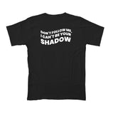 Playera negra “DON’T FOLLOW ME, I CAN’T BE YOUR SHADOW”